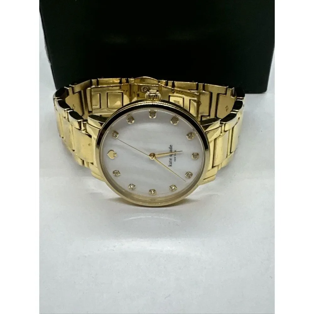 Kate Spade New York 0007 Women's Gold Stainless Steel Analog Dial Watch JNA109
